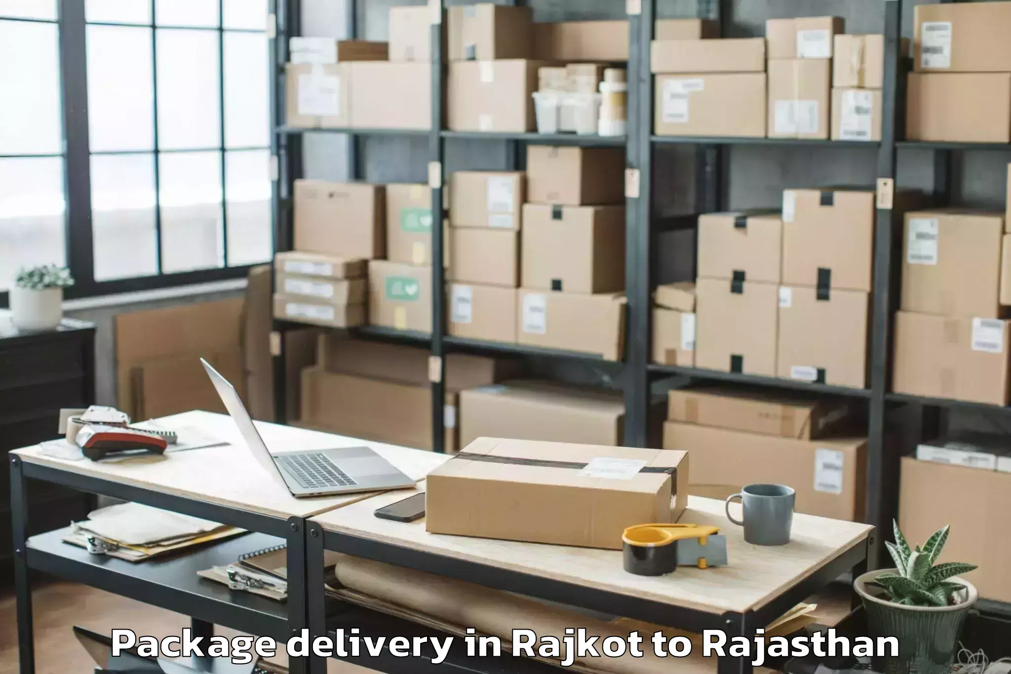 Book Rajkot to Ladnu Package Delivery Online